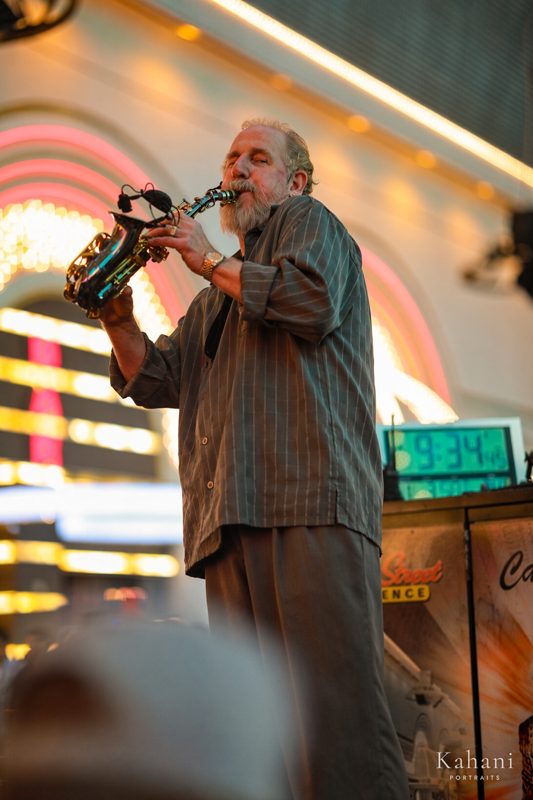 Saxophone player under casino lights